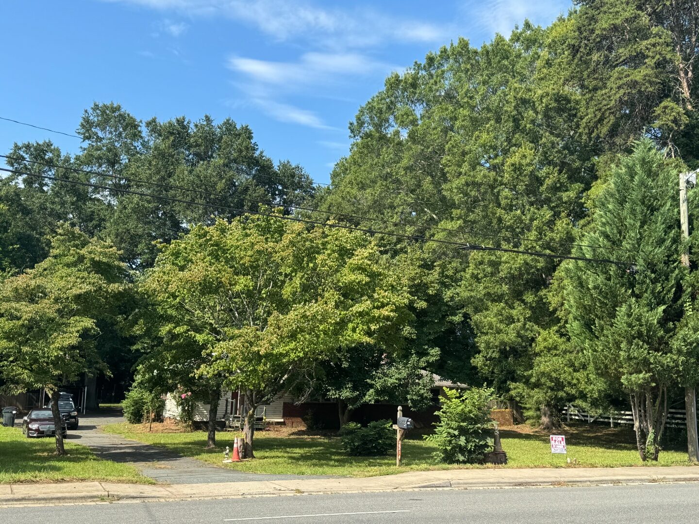 7214 Lawyers Road frontage viewed from across the street.